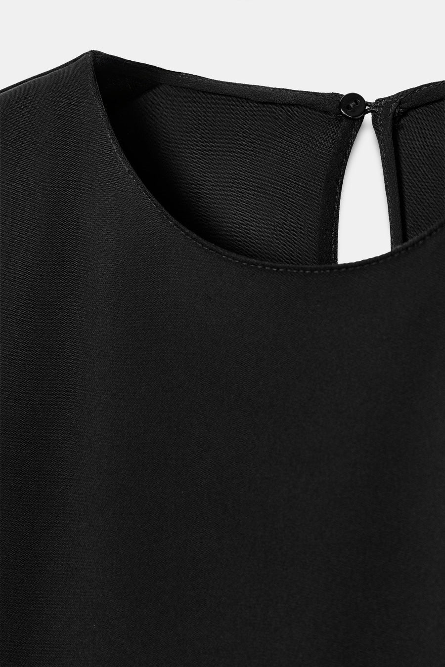 VESTIDO CORTO BAJO ASIMÉTRICO